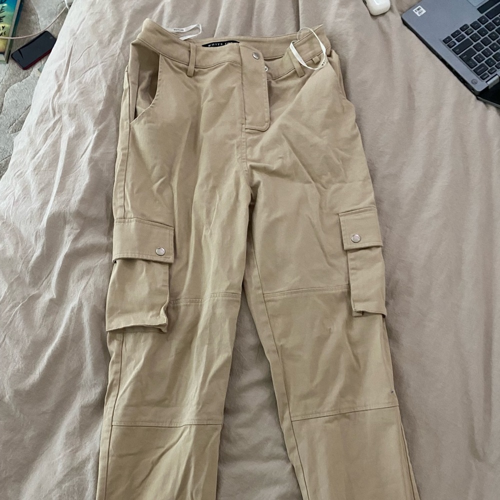 White fox boutique raw hem high waisted cargo pants.